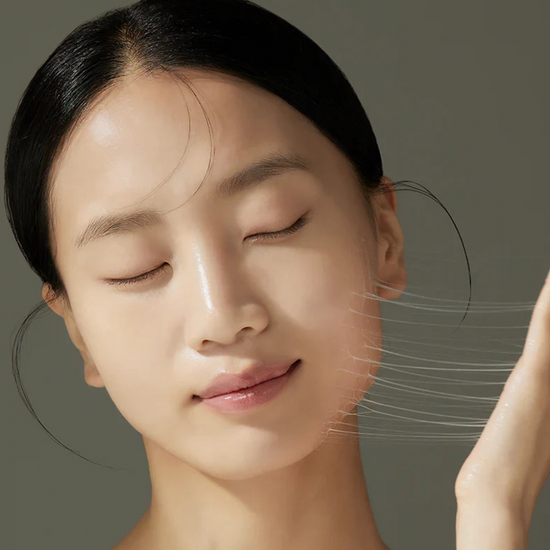 JUMISO Snail Mucin 95 + Peptide Facial Essence on the face